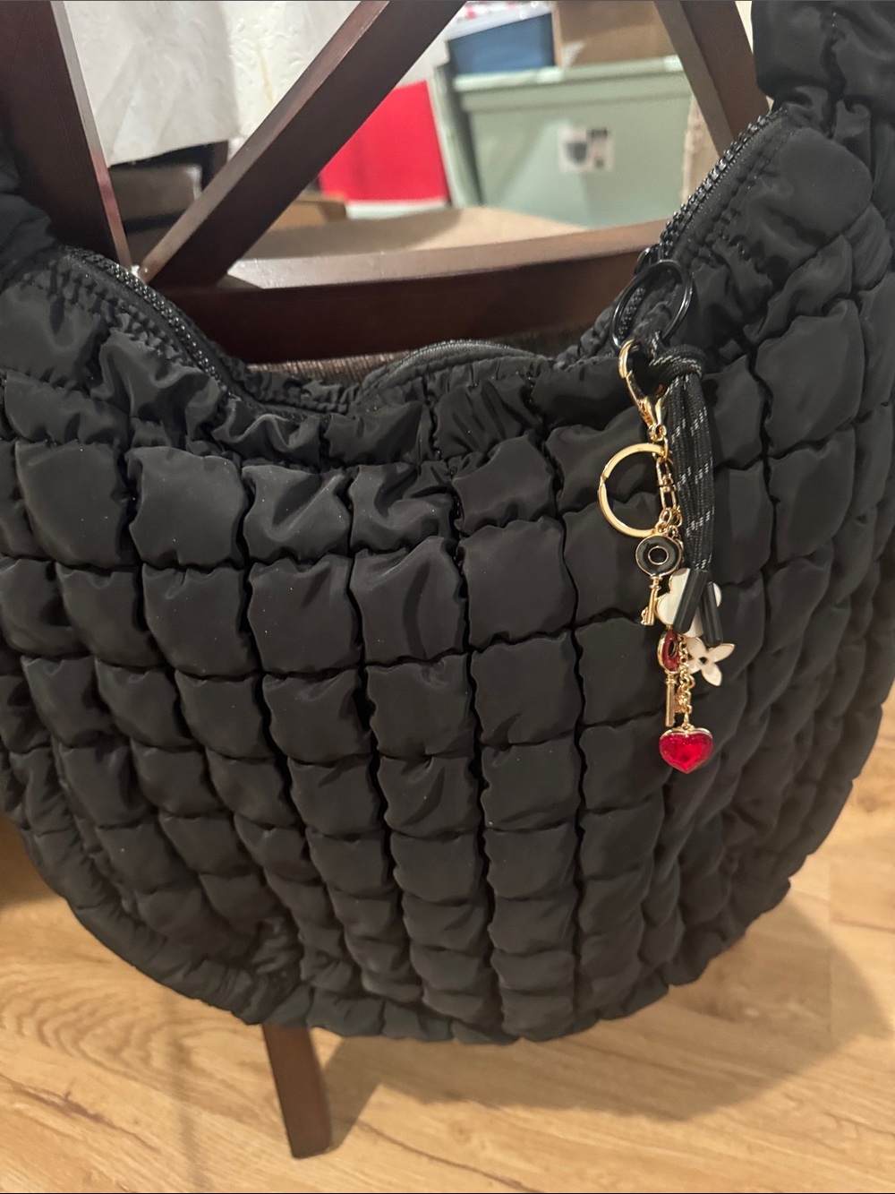 Quilted Black Shoulder Bag with Charm Accent